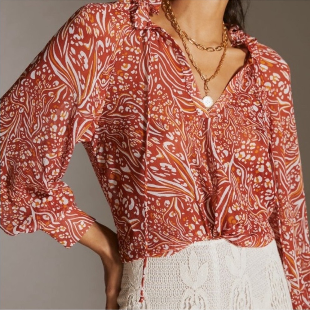 Anthropologie Sheer Printed Peasant Blouse
Orange Motif small